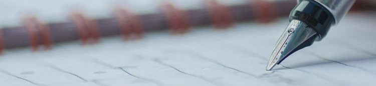 Close up image of a fountain pen writing on paper