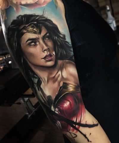 Wonder Woman tattoo on Cassandra's upper arm