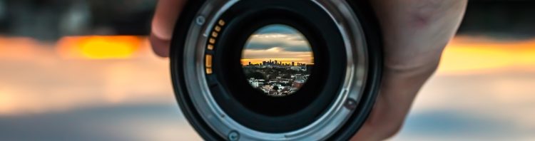 Cityscape shown through a camera lens